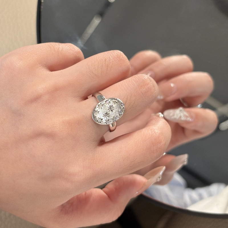 Vintage-style, understated luxury, niche, brushed oval star ring and earring set; retro, exquisite, unique, and versatile.