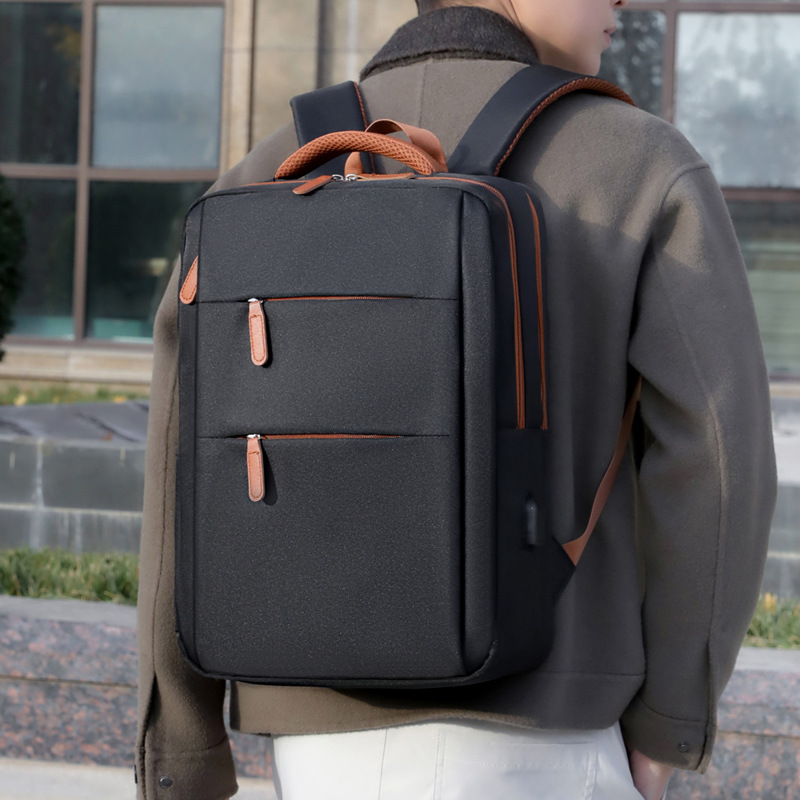 Trendy casual schoolrugzak voor heren, geschikt voor grensoverschrijdend gebruik, met logo en laptoptas, eenvoudig ontwerp._voghion.com