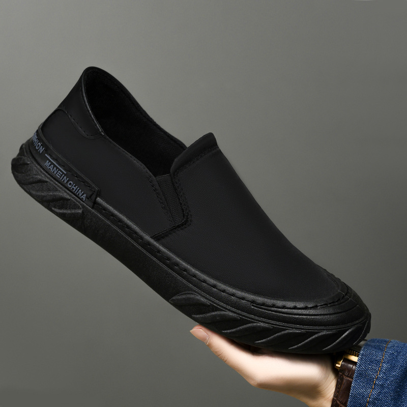Zapatos de lona para hombres nuevos zapatos de trabajo negros simples de moda al por mayor.