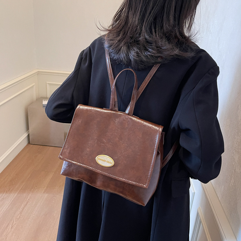 Mochila coreana retro de estilo universitario 2024 invierno nuevo simple de gran capacidad de mano mochila de hombro para viajar