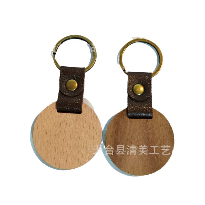 Llavero de madera de nogal negro de cuero spot logo tallado tronco de bambú pu cabeza de llavero colgante