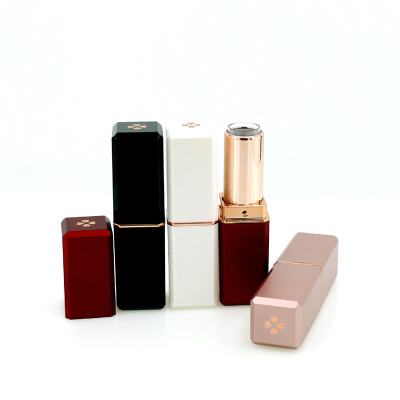 Tubo de lápiz labial al por mayor en stock trébol multicolor tubo de lápiz labial tubo vacío 12,1 calibre imprimible logotipo lápiz labial tubo