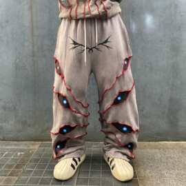 欧美个性眼睛刺绣长裤街头设计感抽绳男女宽松风秋冬加绒休闲卫裤