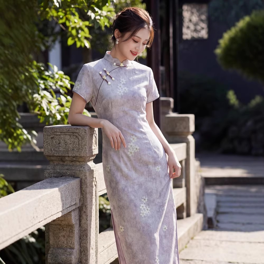贝之韵紫花改良绣花长款旗袍女2026春新款少女短袖年轻款上班穿