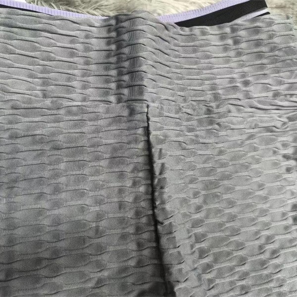 Fábrica de comercio exterior transfronterizo eliminación de almacenamiento de pantalones deportivos ajustados de la mujer almacenamiento de ropa de yoga set transmisión en vivo