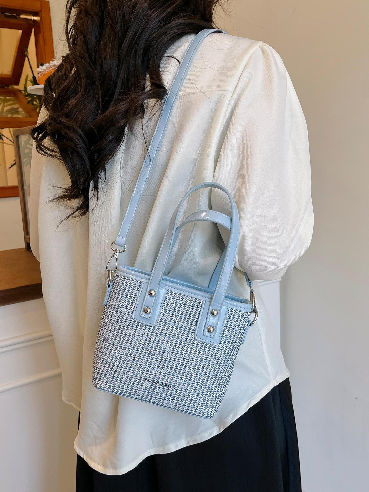 Bolsa de balde de mano caliente de verano para mujeres 2025 nueva bolsa de playa de vacaciones de playa bolsa de tejido bolsa de paja