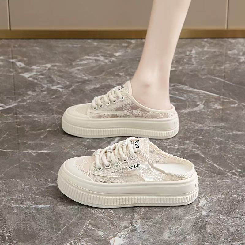 Perezoso con cabeza media zapatillas para mujeres 2026 verano nuevo mallas transpirables zapatos blancos coreanos versátiles zapatillas frías de un pie