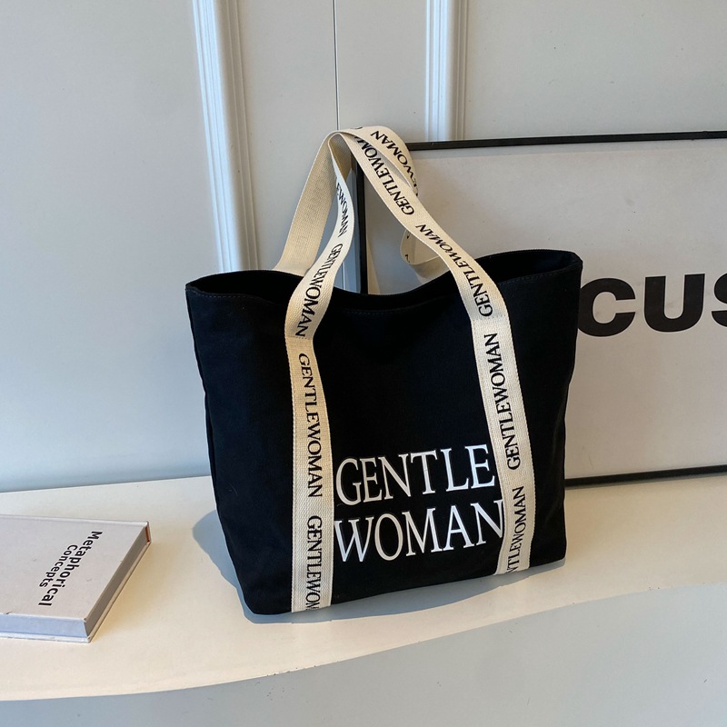タイのキャプテンウーマン大アルファベットプリントキャンバスバッグ2024新作質感カジュアルファッションショルダーバッグ