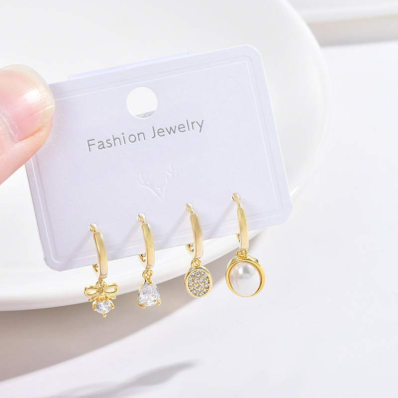 Fashion Bow Knot Copper Inlay Zircon Dangling Earrings 2 Pairs display picture 2