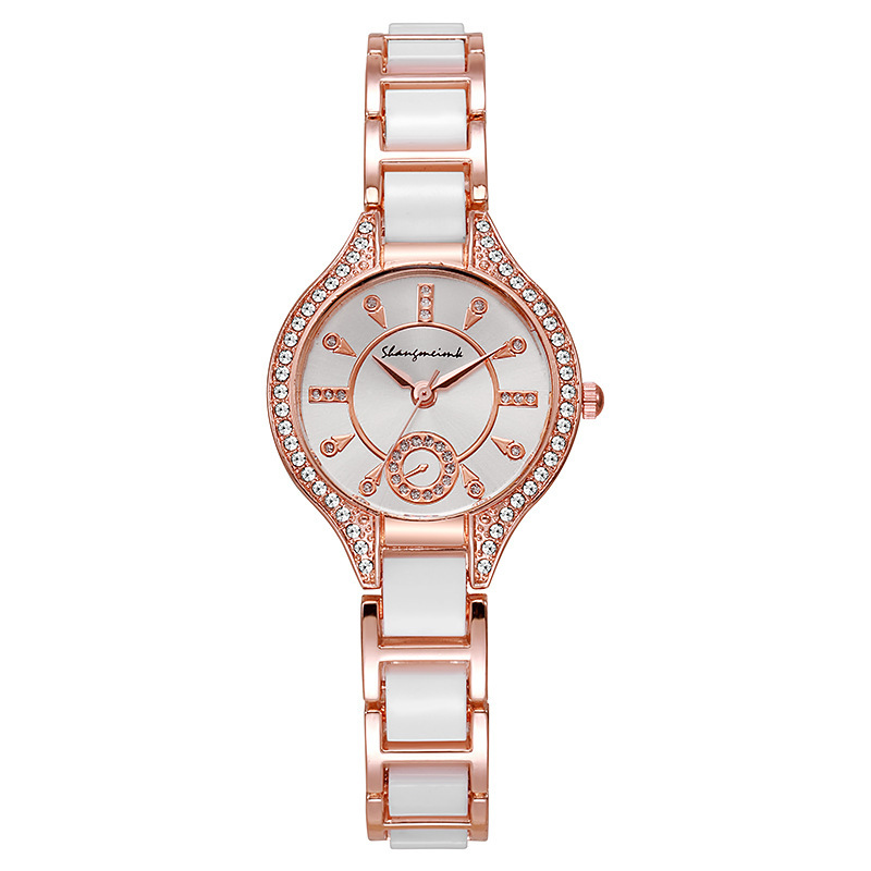 2025 Año de la Serpiente Moda para mujer, moneda fuerte, reloj de cuarzo de cerámica de aleación con reloj de cuarzo de acero al por mayor