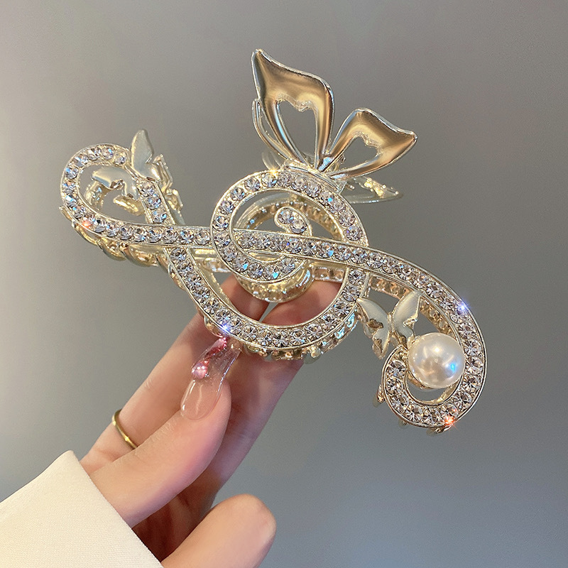 Mujeres Elegante Notas Aleación Enchapado Embutido Perlas Artificiales Diamantes De Imitación Garras De Pelo display picture 3