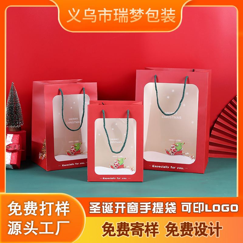 Bolsa de regalo de Navidad ventana transparente bolsa de papel portátil copo de nieve bolsa de papel Kraft exquisito embalaje bolsa de regalo en stock