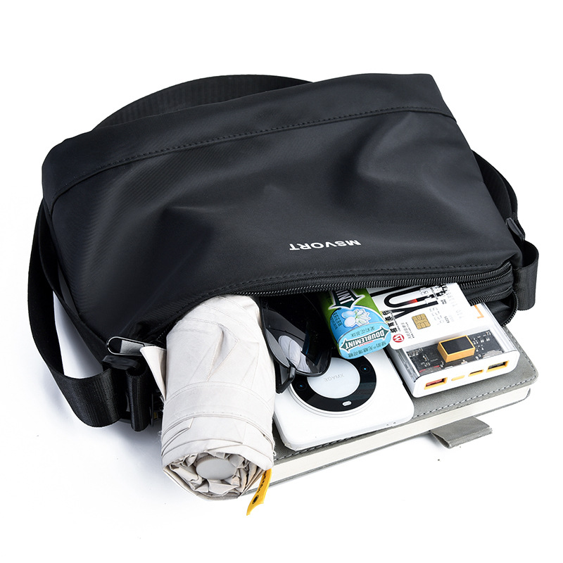 Bolso de hombro de hombre casual de nuevo estilo transfronterizo, bolso de hombre de viaje de todo fósforo negro ligero, bolso de mensajero de moda ins de estilo coreano