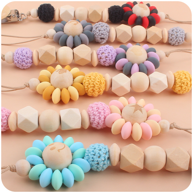 Bebé suministros chupete de madera clip creativo bebé patrón de cuentas de madera de dibujos animados flor chupete cadena Amazon nuevo