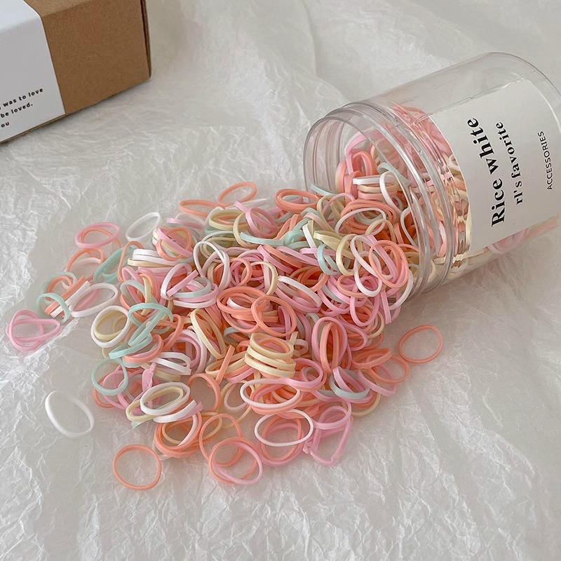 Cuerda para la cabeza con lazo para el cabello con cola de caballo para niños pequeños 2025 nueva banda de goma desechable para bebés cuerda para el cabello con funda de cuero pequeña duradera