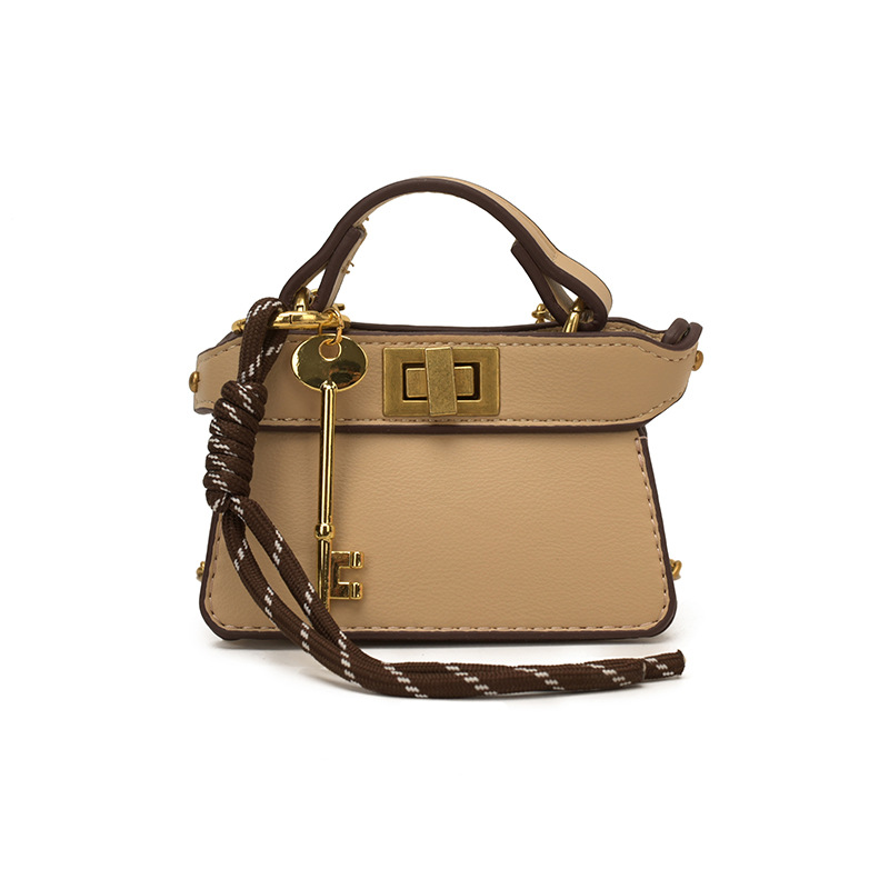 Coreano simple bolso de niña de color sólido mini bolso de bebé 2026 bolso para niños de comercio exterior transfronterizo
