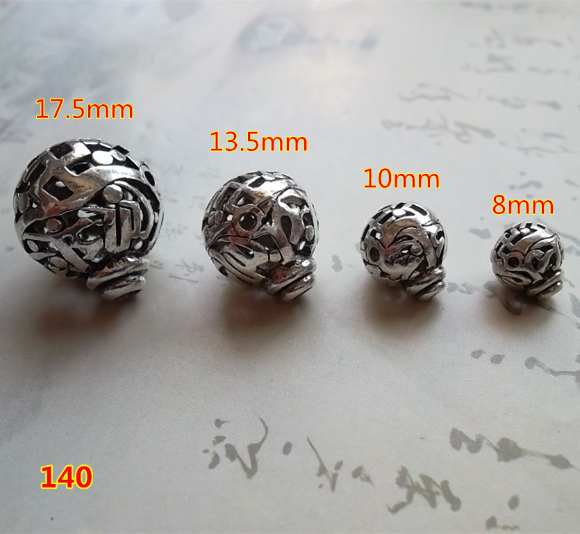 藏银镂空花球佛头三通140