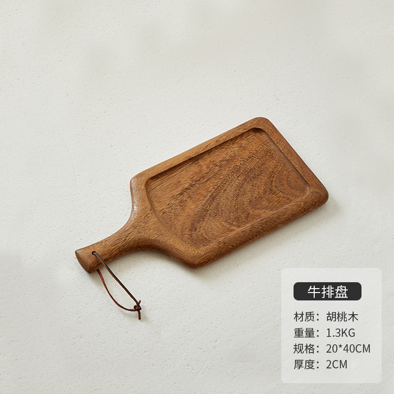 木のステーキの食事皿日本式の木のピザの皿の牛の板の食器の木の皿の木のトレーの洋食は皿を並べます。|undefined