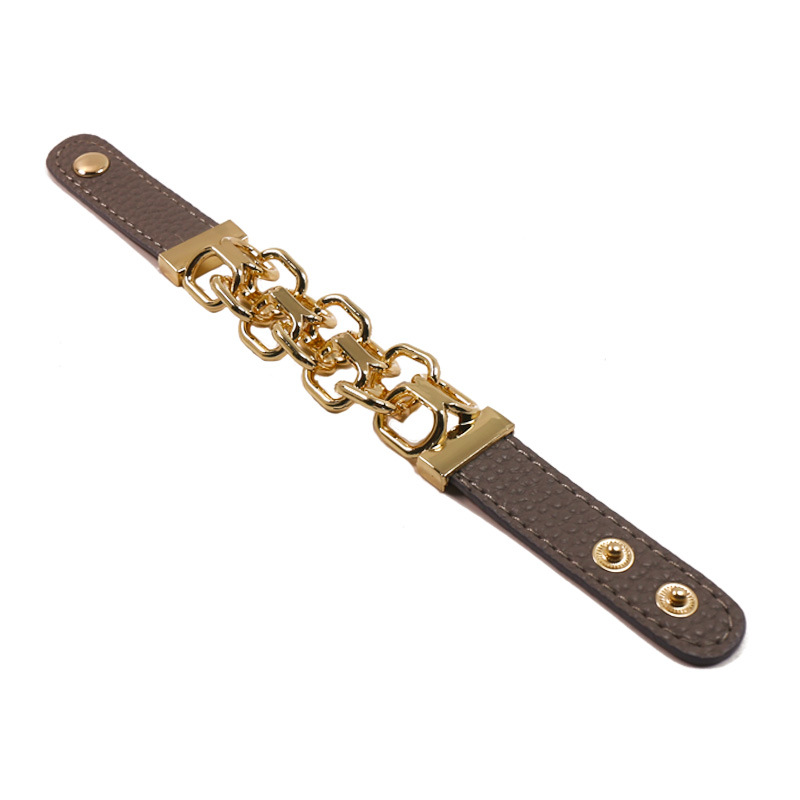 Bracciale in pelle PU tinta unita con personalità europea e americana, tendenza della personalità punk, foto di strada casual e neutra_voghion.com