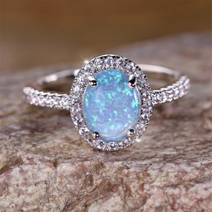 Cross-border wish new egg-shaped edge drill four-claw ring simple personality niche light luxury elegant ring ring wholesale