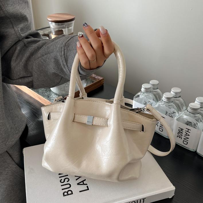 Nicho de diseño de moda bolsas de balde para mujeres 2025, nueva moda bolsas de hombro de estilo extranjero, bolsas de mano de alto nivel.