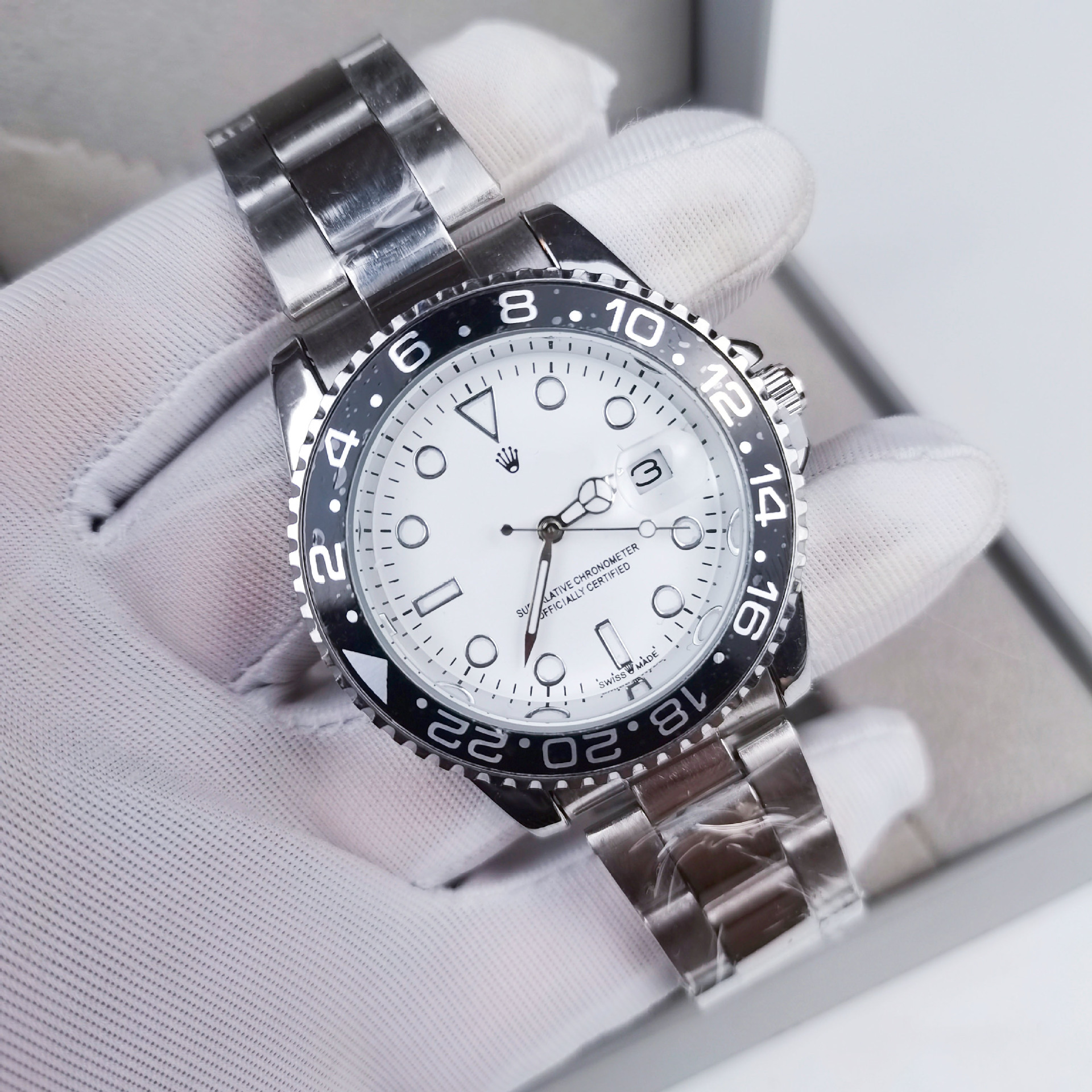 Three black shell and white surface cola rings