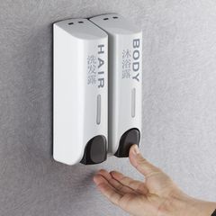 Wall-mounted manual soap dispenser dual-head shampoo and body wash soap dispenser bottle for hotels