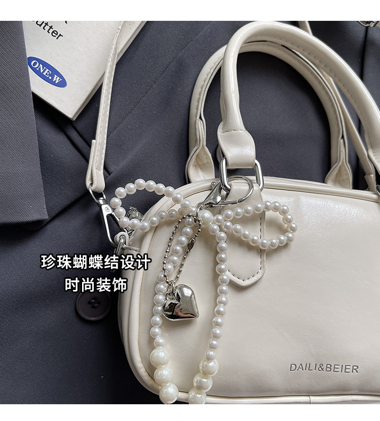 A fashionable Korean-style small square bag for women in the summer of 2025, featuring a simple and retro single-shoulder, crossbody and hand-held pillow bag undefined