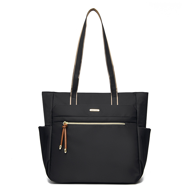 Bolso Tote casual coreano 2025 nueva moda textura de viaje salvaje bolso de mano de un solo hombro suministro directo de fábrica