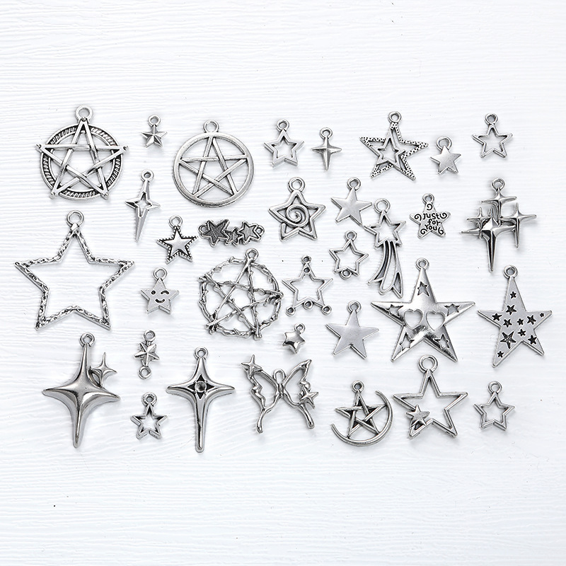 Wholesale starry star five-pointed star four mans star pendant DIY vintage zinc alloy jewelry accessories zakka