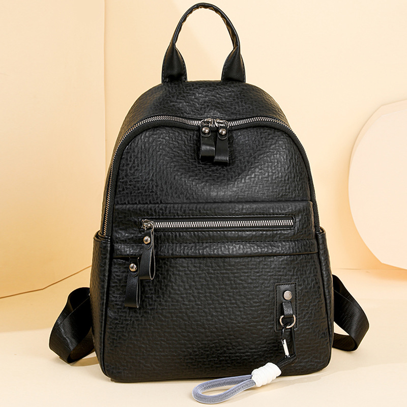 Mochila de cuero suave para mujer de estilo nuevo al por mayor transfronterizo 2024 mochila de moda simple y versátil mochila de viaje de gran capacidad