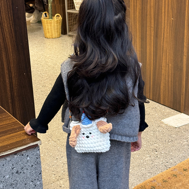 Bolsos de hombro de dibujos animados japoneses para niños y niñas otoño y invierno de lana tejida perros de tramo oblicuo 2025 nuevo mini bolso infantil