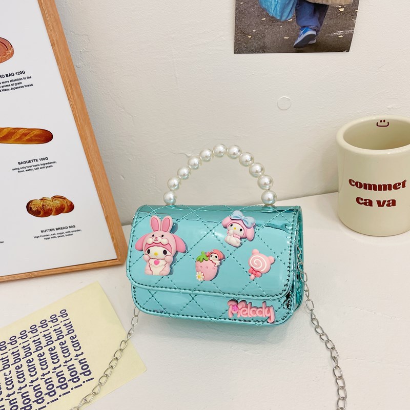 Bolso infantil 2024 nuevo estilo coreano de cadena de dibujos animados bolso de hombro estilo Xiaoxiang Ling mochila para hombres y mujeres bolsos pequeños