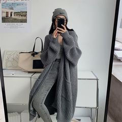 怠惰な風の太い線のニットのコートの女性の秋冬の新型の百合のゆったりした中の長いセーターのカーディガンの上着の潮