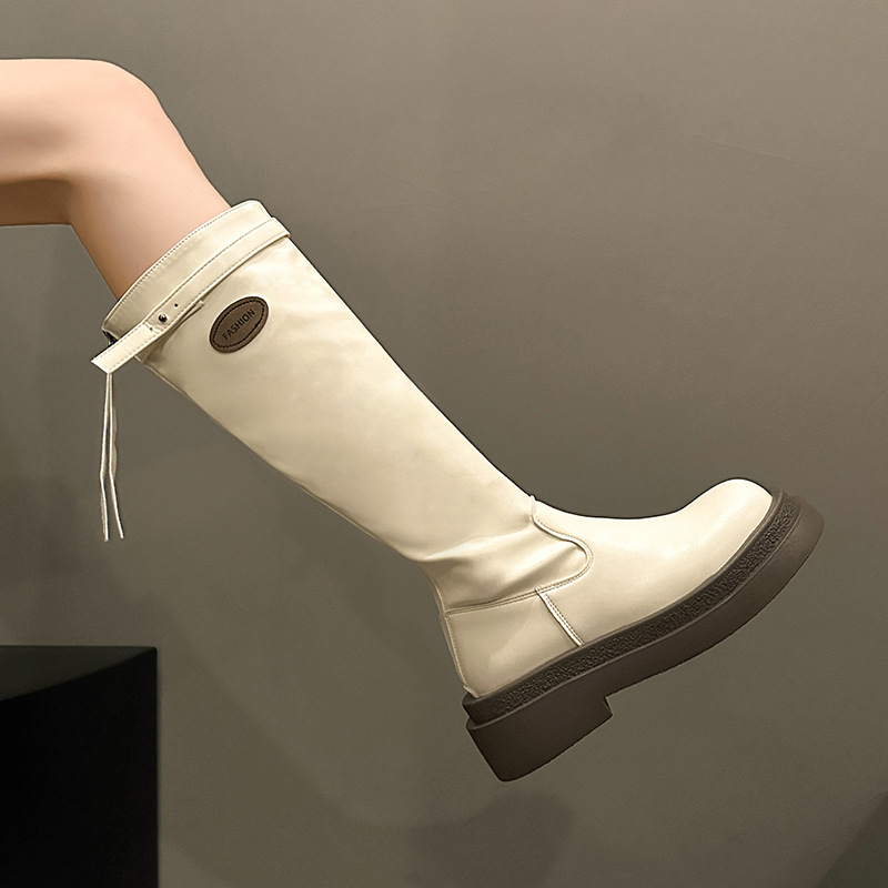 フランスの白いブーツの女性は膝の厚い底のファッション靴のカジュアルなブーツの後でファスナーの長靴の現物の卸売りをします。