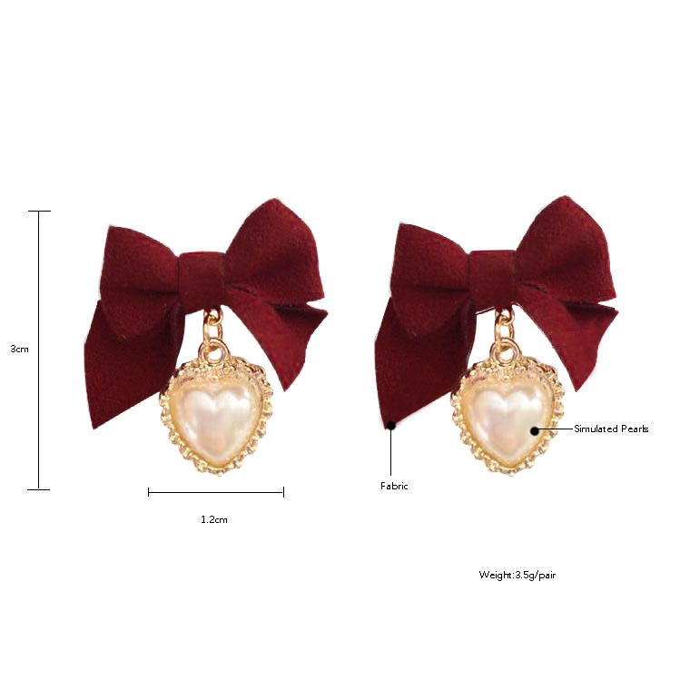 Autumn And Winter New Korean Retro Velvet Bow Heart Pearl Earrings display picture 1