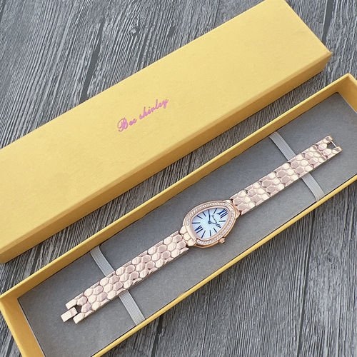 Wholesale elegant and fashionable steel strap ladies watch, light luxury niche creative snake-shaped full diamond English watch