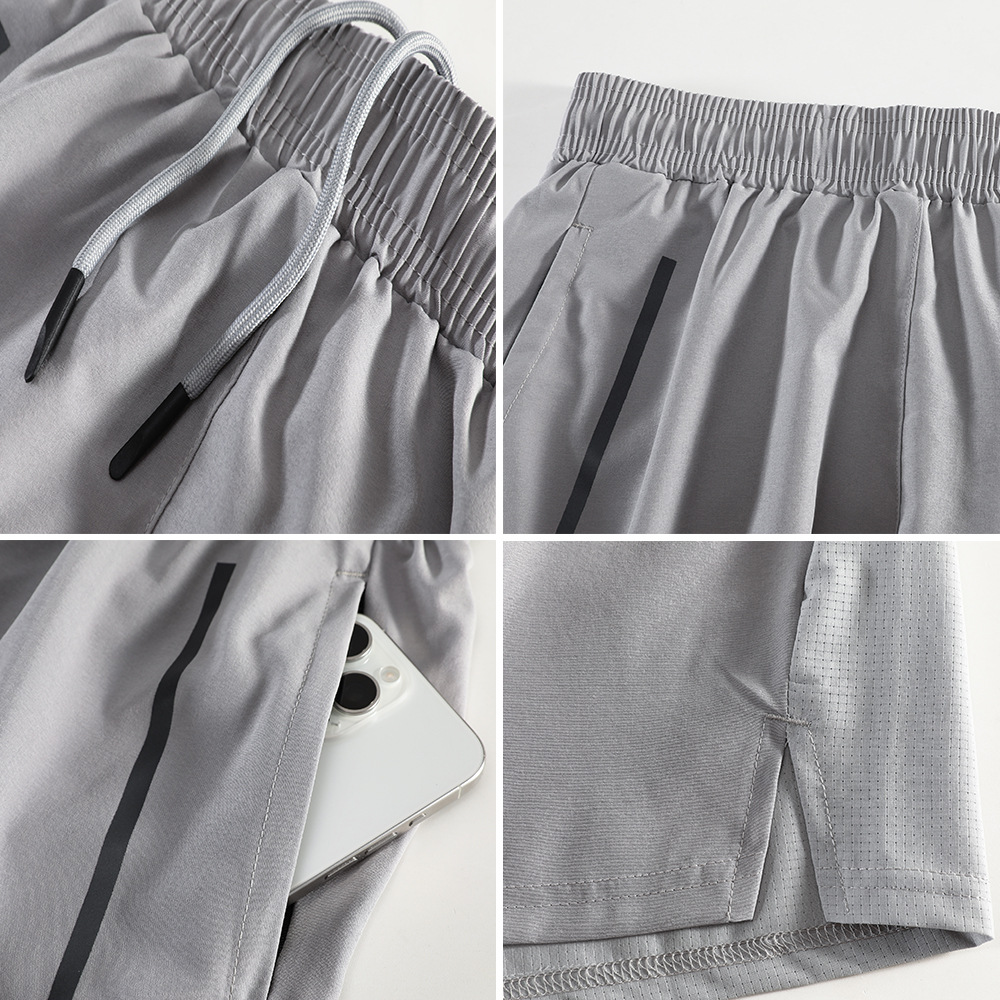 Pantalones deportivos grandes transfronterizos para hombres de verano ocio para correr pantalones de cinco puntos secos rápidos pantalones de entrenamiento transpirables pantalones de baloncesto