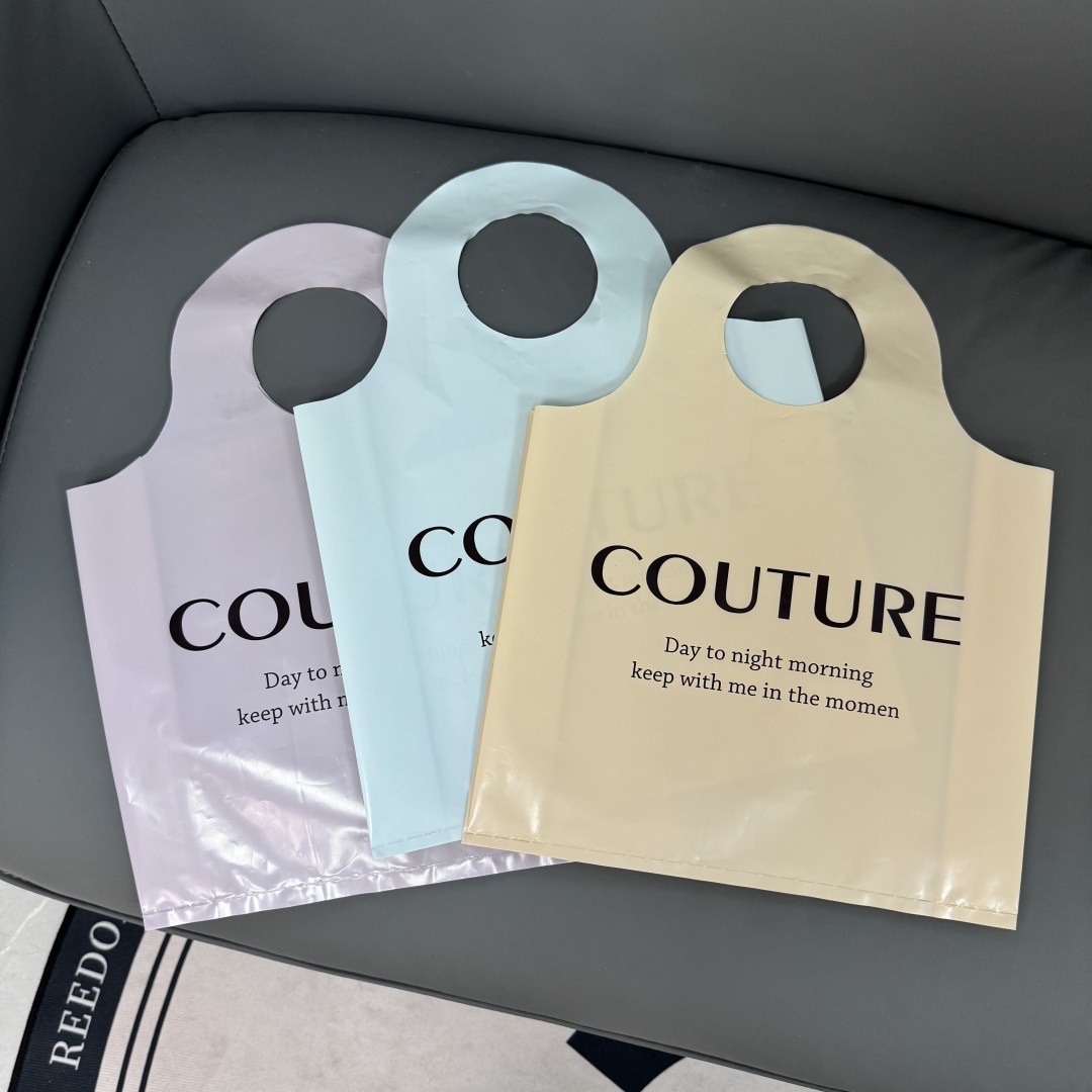 服装店手提袋礼品塑料衣服女装店用装打包用袋子购物收纳圆口高档