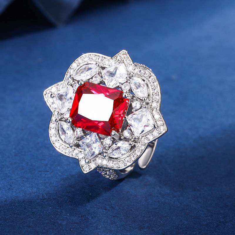 2024 nuevo estilo Zhuang Shengsheng joyería fondo de cobre chapado en oro simulación corindón rojo cristal puntiagudo azul traje retro avanzado mujer 8*10