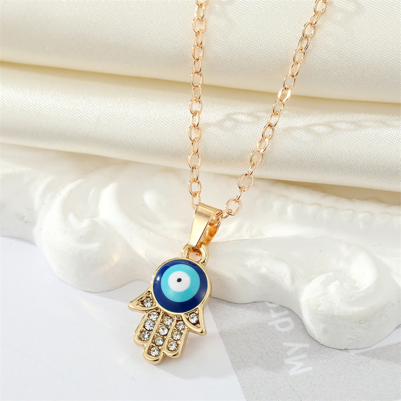 Alloy Diamond Drop Oil Devil's Eye Fatima's Hand Earring Necklace Set display picture 3