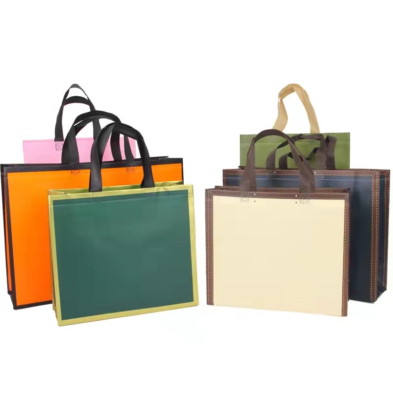 Bolso no tejido recubierto en stock impreso LOGO bolsa de ropa de moda embalaje de regalo bolsa de Banco de costura impresa