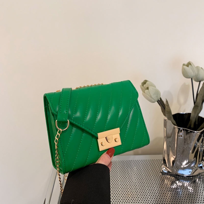 Bolso de costura de automóvil para mujeres fresco estilo exterior bolso de color sólido 2025 moda nueva bolsa de cinturón de cerradura de primavera