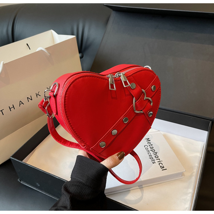 Internet celebridad personalizada de moda del todo-fósforo de color sólido en forma de corazón bolsa de costura bolsa de las mujeres nicho diseño crossbody hombro bolsa de las axilas