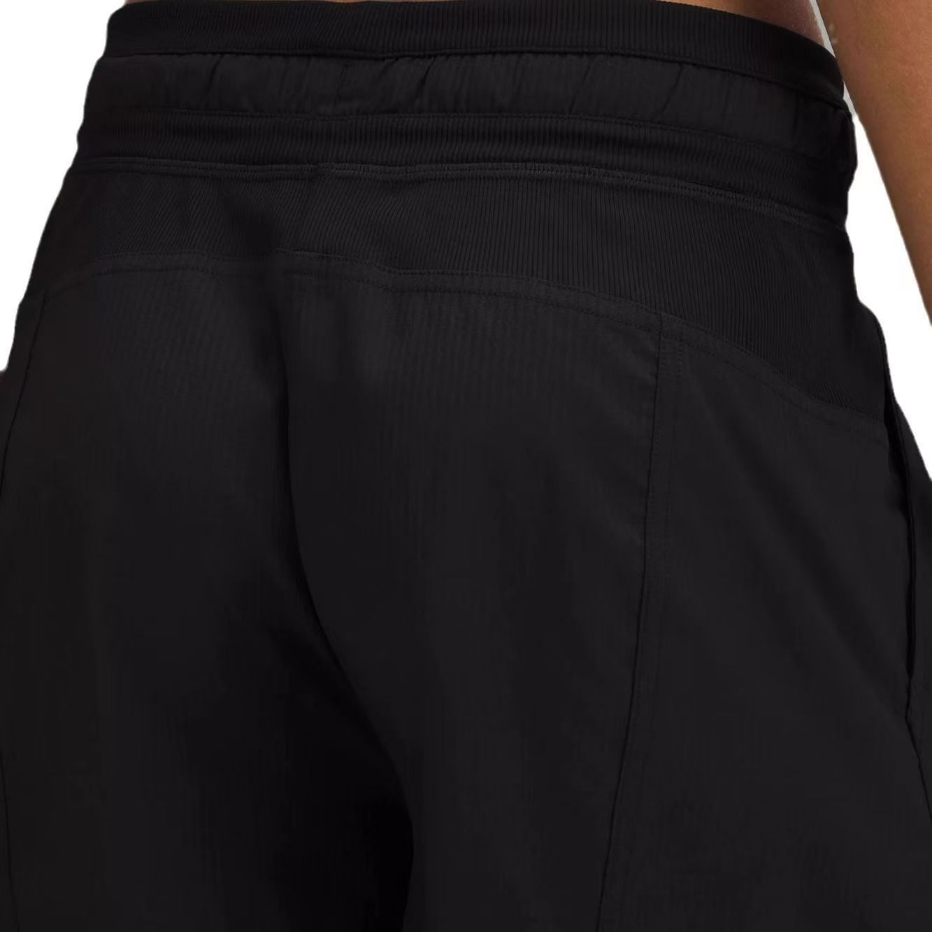 Pantalones cortos deportivos para mujeres, trote, cinturón de bolsillo, pantalones secos rápidos, pantalones de entrenamiento, pantalones de Jinlun.