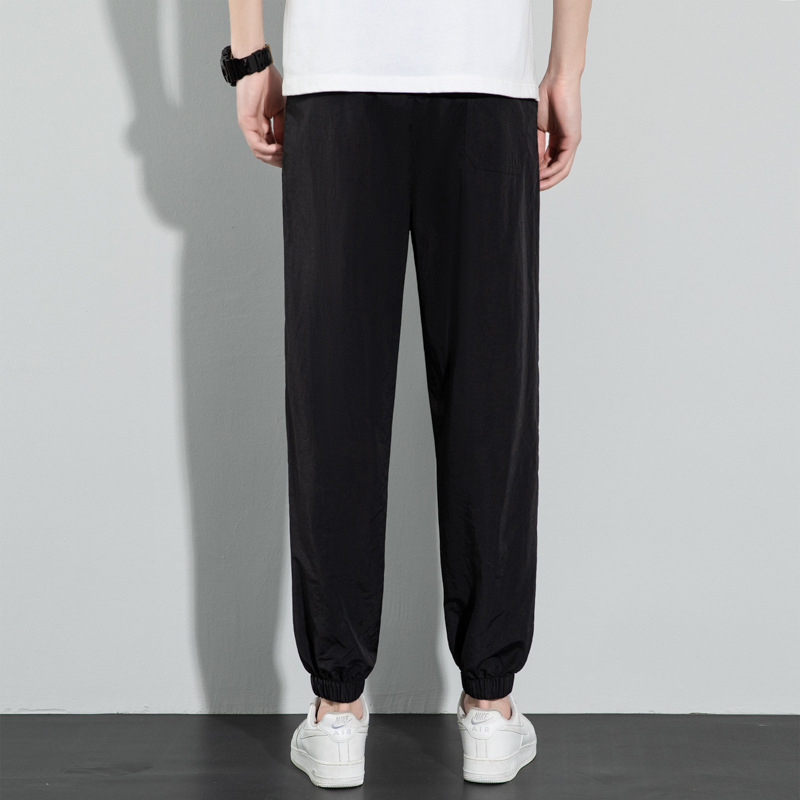 Pantalones de seda de hielo para hombres 2024 verano delgado suelto transpirable pantalones deportivos de secado rápido pantalones elásticos de pies de hielo casuales