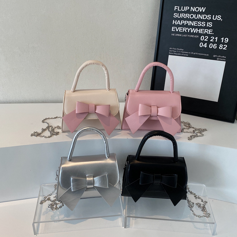 Bolso de mujer 2025 tendencia de verano nueva moda dulce arco de hombro bolso de mano bolso de mano