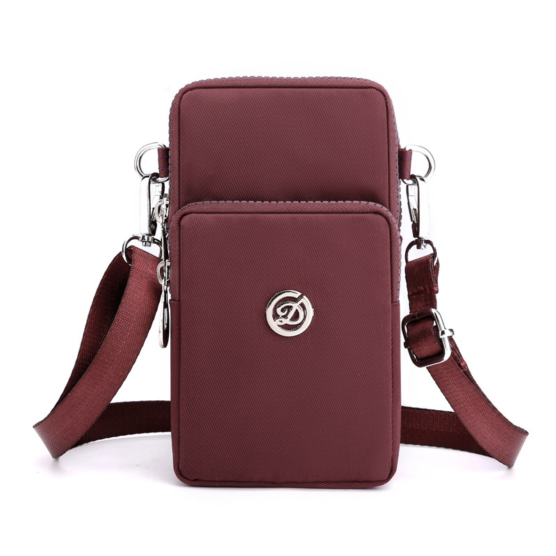 Bolsa de teléfono móvil al por mayor transfronteriza bolsa de mensajero de las mujeres Mini bolsa pequeña bolsa de muñeca bolsa de teléfono móvil Halter monedero tela