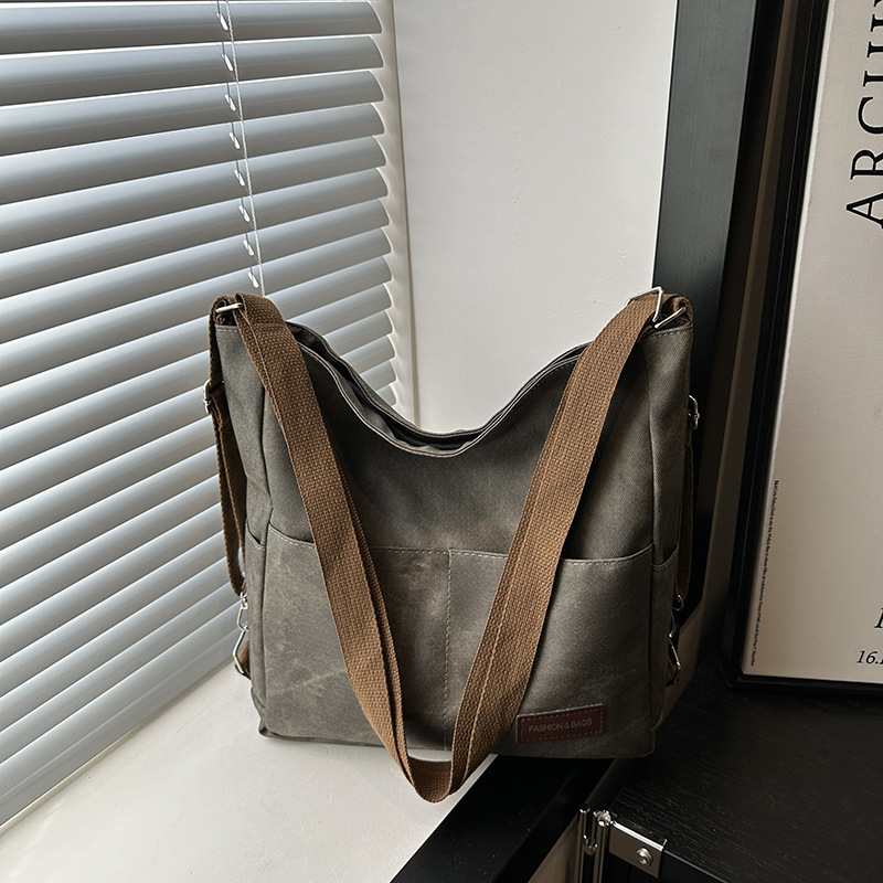 2024 otoño y invierno tendencia de nicho nuevo tipo de mochila de hombro para mujeres moda casual versátil mochila de viaje casual