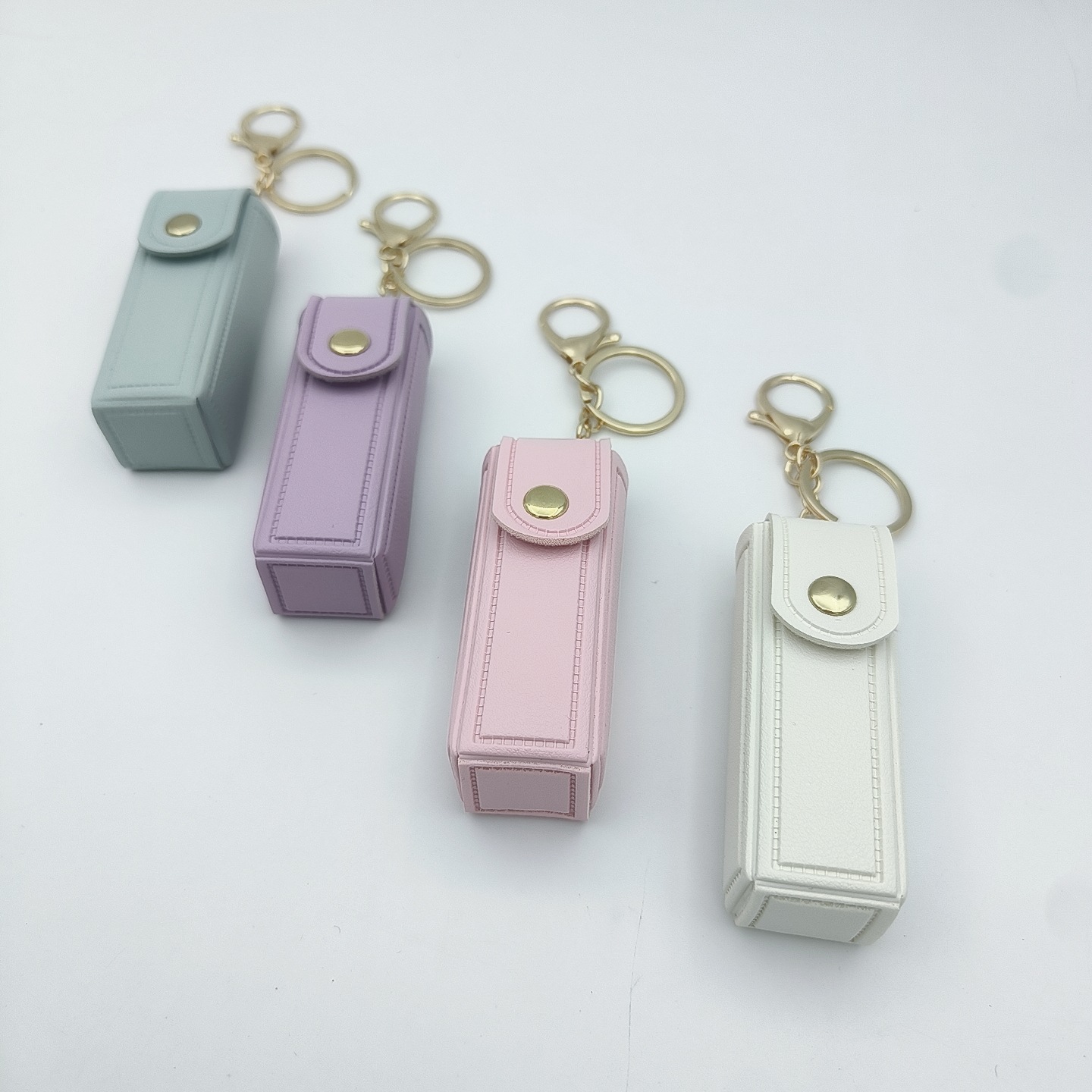 Bolso de cambio transfronterizo sobre rojo espejo creativo llavero colgante pequeño PU cuero bolso de coche accesorios accesorios en stock